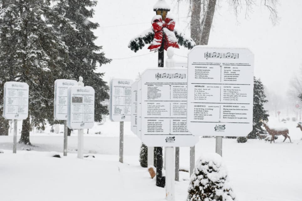 The walkway is lined with plaques with the first verse of “Silent Night” in over 300 languages. (Bronner's CHRISTmas Wonderland)