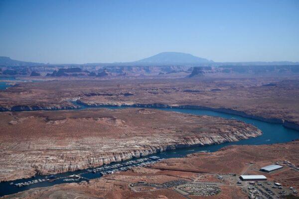 Boats are seen in low water at the Antelope Point Marina in Lake Powell on the Colorado River in Page, Ariz., on Sept. 4, 2022. (Robyn Beck/AFP via Getty Images)