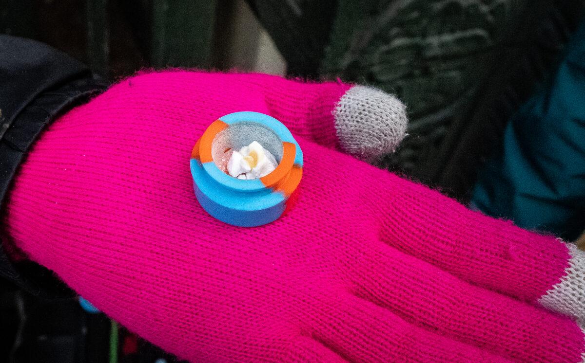 A drug user displays a fentanyl hit before usage in San Francisco, Calif., on Feb. 23, 2023. (John Fredricks/The Epoch Times)