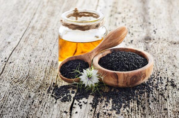 <span data-preserver-spaces="true">Black cumin seeds and oil </span>(Dionisvera/Shutterstock)