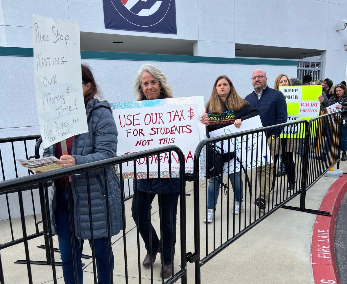People protest a special meeting to discuss critical race theory with the Temecula Valley Unified School District Board and invited experts in Temecula, Calif., on March 22, 2023. (Brad Jones/The Epoch Times)