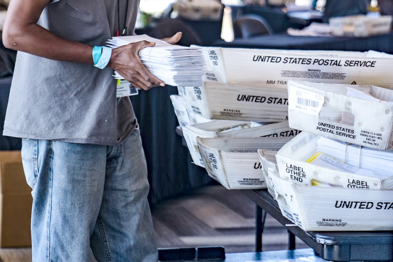 An election worker processes absentee ballots in Atlanta, Ga., on Nov. 2, 2020. (Megan Varner/Getty Images)