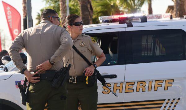 Sheriff's Department officers patrol near the scene of a crime in San Bernardino, Calif., on Dec. 2, 2015. (Frederic J. Brown/AFP via Getty Images)