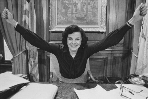 Dianne Feinstein, her arms outstretched in celebration, in her office at San Francisco City Hall after she was elected the city's mayor, circa 1978. (Nick Allen/Pictorial Parade/Archive Photos/Getty Images)