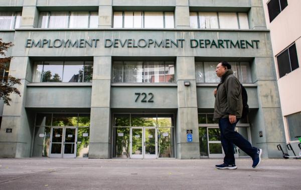 People walk past the California Employment Development Department (EDD) in Sacramento, Calif., on April 18, 2022. (John Fredricks/The Epoch Times)