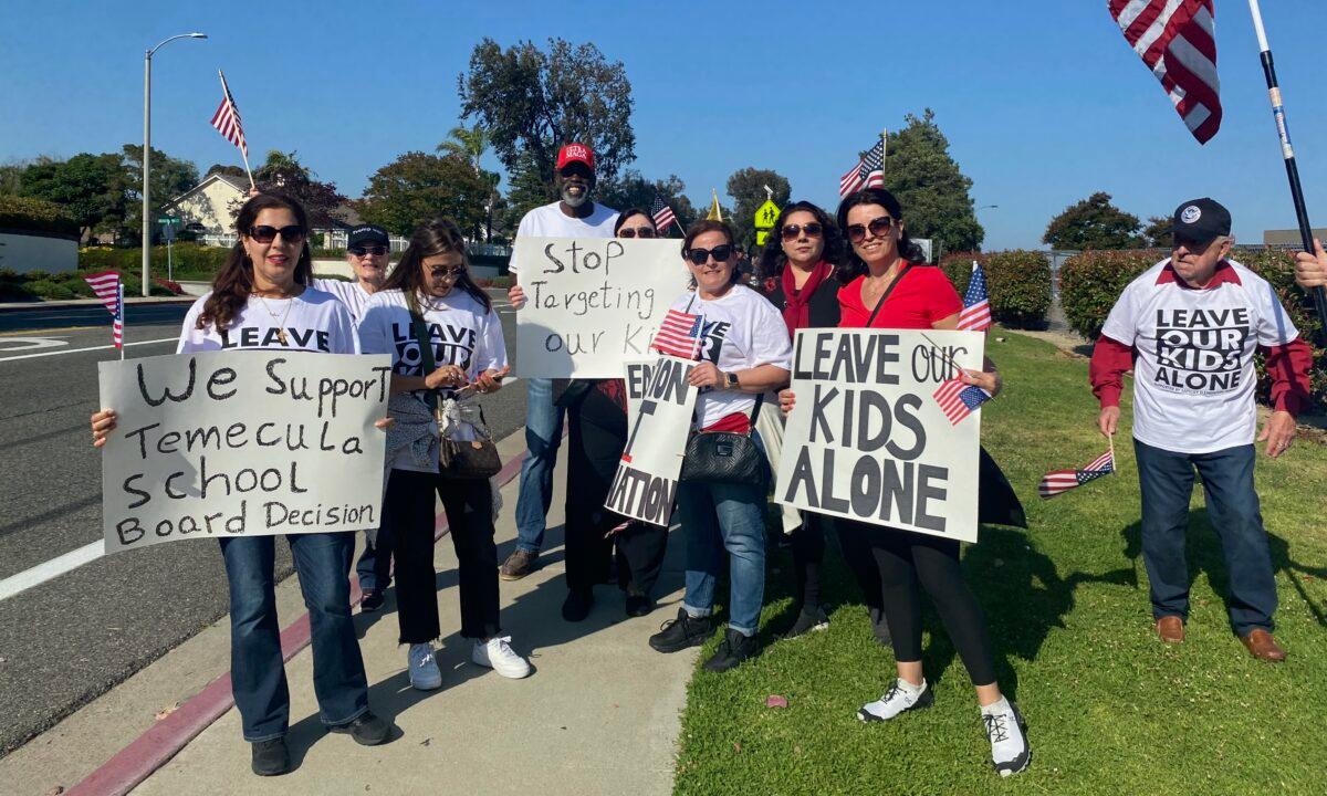 Parents in support of the Temecula Valley Unified school board's decision to terminate the district’s superintendent amid controversy surrounding critical race theory and other school curriculum attend a board meeting in Temecula, Calif., on June 13, 2023. (Micaela Ricaforte/The Epoch Times)