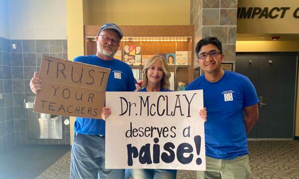 Members of the local teachers' union, Temecula Valley Educators’ Association, opposing the Temecula Valley Unified school board's decision to terminate the district’s superintendent amid controversy surrounding critical race theory and school curriculum attend a board meeting in Temecula, Calif., on June 13, 2023. (Micaela Ricaforte/The Epoch Times)