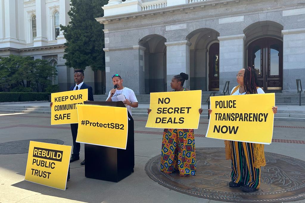 J Vasquez, a representative with the Communities United For Restorative Justice, speaks in front of the state Capitol in Sacramento, Calif., on June 14, 2023. (Tran Nguyen/AP Photo)