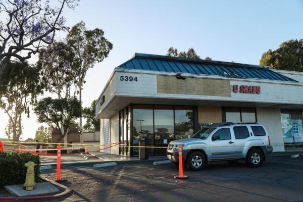 Burnt roof of the Shabu Shabu House restaurant after the Orange County Fire Authority extinguished a fire in the building in Irvine, Calif., on June 21, 2023. (Julianne Foster/The Epoch Times)