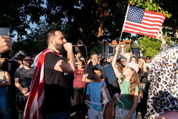 The Glendale Unified School Board’s final meeting of the school year draws dozens of parents, community members, and activists protesting over the district’s policies on LGBT content in schools in Glendale, Calif., on June 20, 2023. (Courtesy of Hasmik Bezirdzhyan)