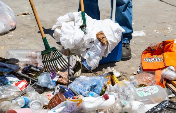 Los Angeles city workers clear trash areas near Santa Monica, Calif., on June 8, 2021. (John Fredricks/The Epoch Times)