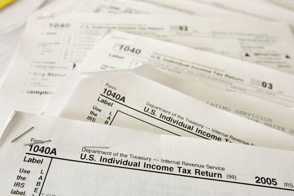 Tax forms from previous years are displayed at Latino Taxes in Oakland, Calif., on April 10, 2007. (Justin Sullivan/Getty Images)