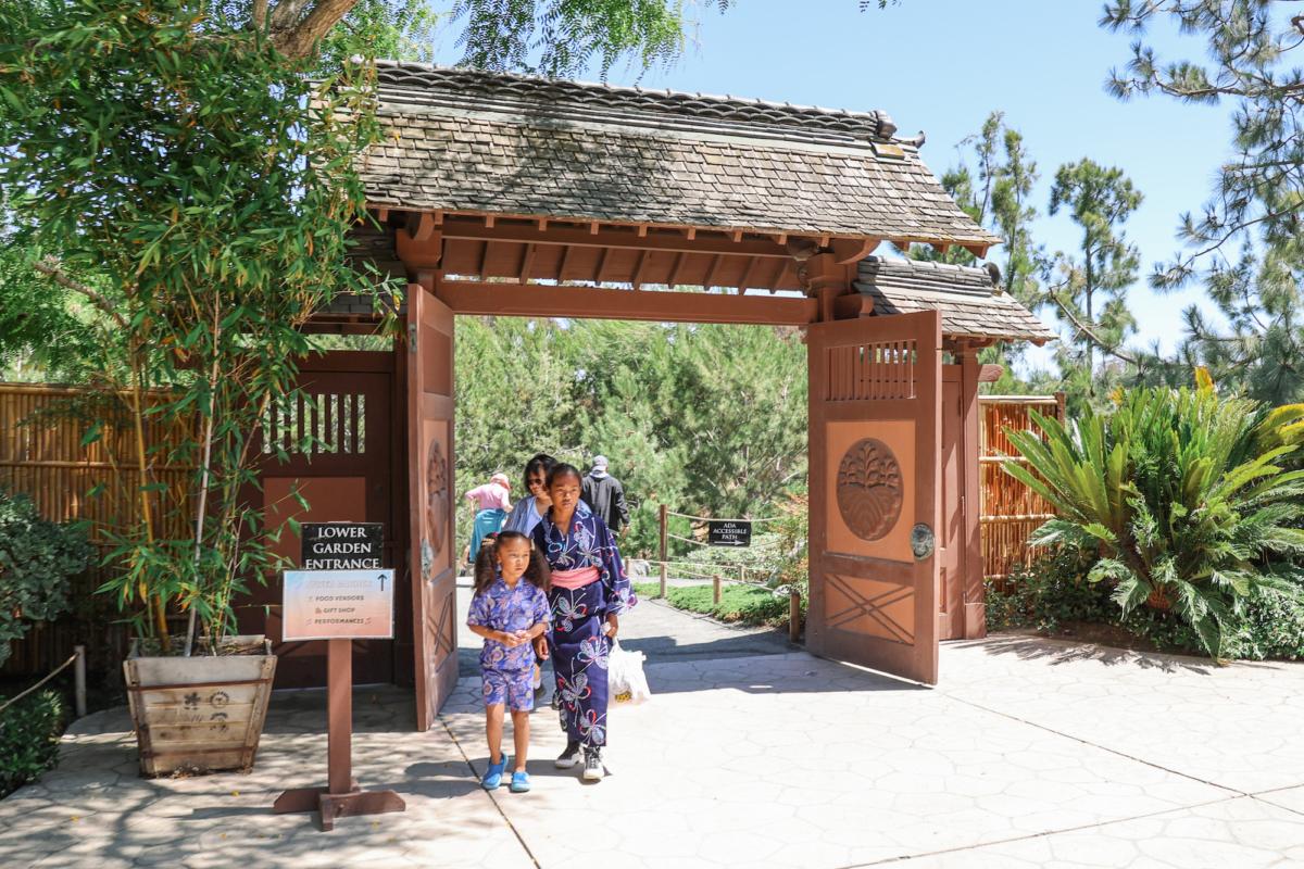 Guests of the Tanabata Festival at the Balboa Park Japanese Friendship Garden wear traditional Japanese kimono dresses in San Diego, Calif., on July 7, 2023. (Julianne Foster/The Epoch Times)