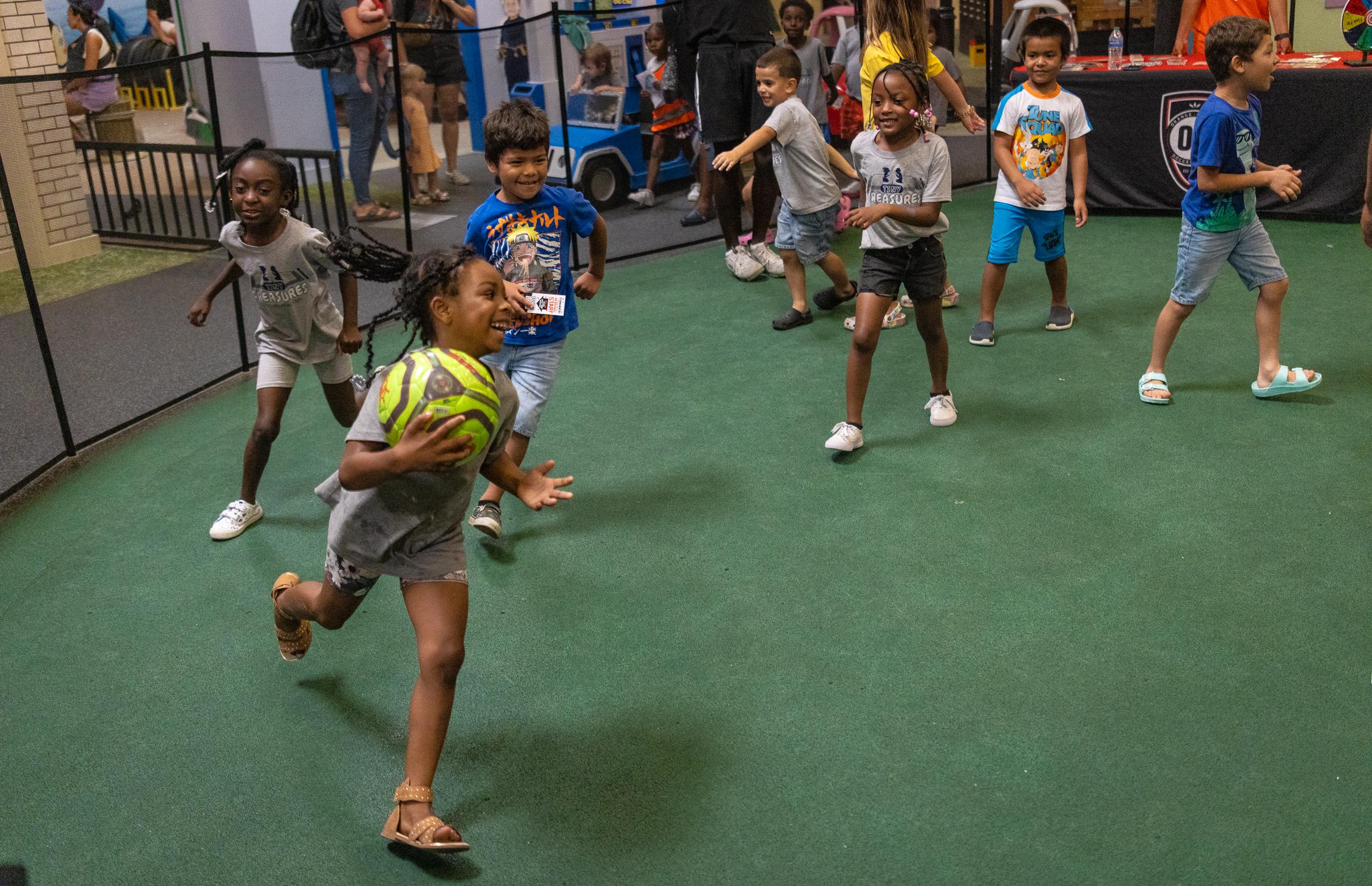 OC Soccer Club Celebrates National Soccer Day by Teaching Children New Moves