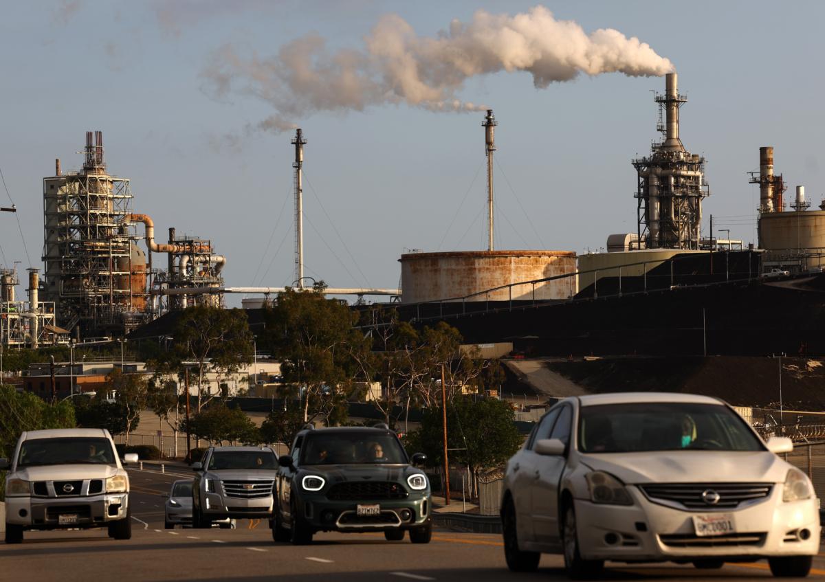 Vehicles pass the Phillips 66 Los Angeles Refinery Wilmington facility in Wilmington, Calif., on Nov. 28, 2022. (Mario Tama/Getty Images)