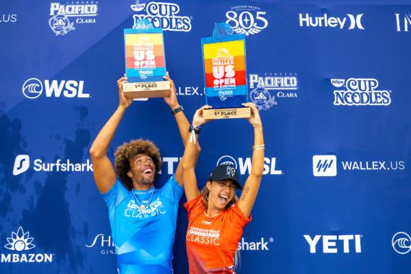 Kaniela Stewart of Hawaii and Kelis Kaleopaa of Hawaii after winning the Final at the Huntington Beach Longboard Classic in Huntington Beach, Calif., on Aug. 6, 2023. (Tommy Pierucki/World Surf League)