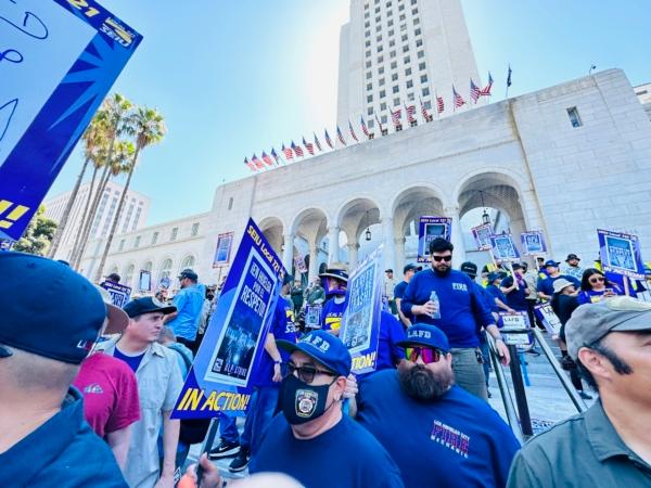 Thousands of unionized Los Angeles city workers walked off their jobs for a one-day strike in Los Angeles on Aug. 8, 2023. (Jill McLaughlin/The Epoch Times)