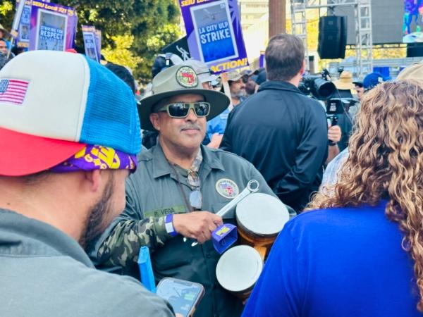 Thousands of unionized Los Angeles city workers walked off their jobs for a one-day strike in Los Angeles on Aug. 8, 2023. (Jill McLaughlin/The Epoch Times)