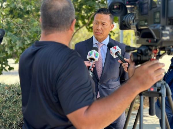 Los Angeles Police Department spokesman Sgt. Bruce Borihanh speaks to news reporters outside the Nordstrom store at the Westfield Topanga Mall in Los Angeles on Aug. 14, 2023. On Saturday, the store was ransacked by more than 30 suspects who stole about $300,000 in handbags and other merchandise. (Jill McLaughlin/The Epoch Times)