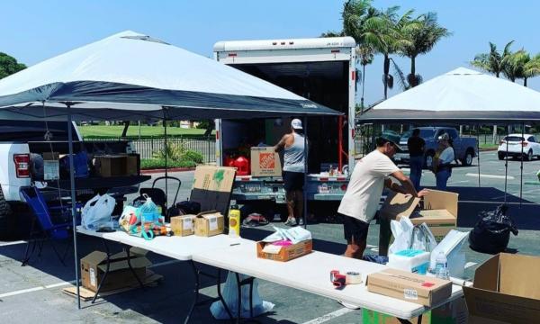 Community members participate in relief efforts to aid victims of the Maui fires at Edison High School in Huntington Beach, Calif., on Aug. 14, 2023. (Courtesy of Kody Afusia)