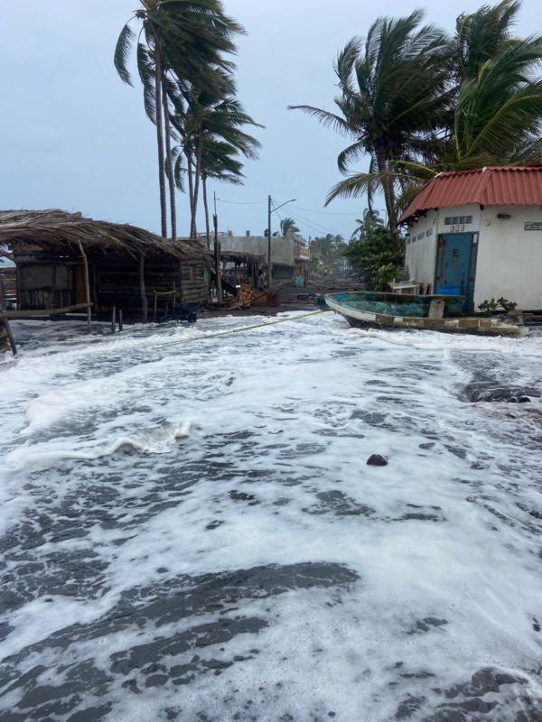 Palm trees sway as the wind blows and water rises, after Hurricane Hilary strengthened into a Category 2 storm, in Armeria, in Colima state, Mexico, in this undated handout photo obtained on Aug. 17, 2023. (Proteccion Civil Estatal Colima via X/Handout via Reuters)