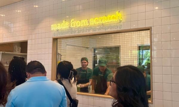 The new location of salad restaurant chain Sweetgreen welcomes customers on its grand opening day in Tustin, Calif., on Aug. 22, 2023. (Carol Cassis/The Epoch Times)
