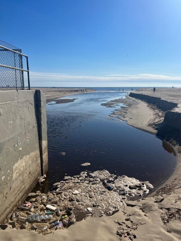 Sewage water flushing out from a storm drain, a day after Tropical Storm Hilary made landfall in Southern California, at Venice Beach in Santa Monica, Calif., on Aug. 21, 2023. (Courtesy of Soledad Ursúa)