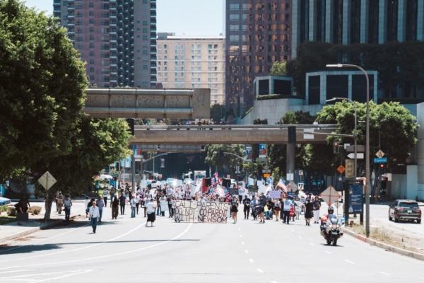 About 200 parental rights demonstrators marched through downtown Los Angeles to protest secret gender transitions in California public schools, on Aug. 22, 2023. (Courtesy of Hasmik Bezirdshyan)
