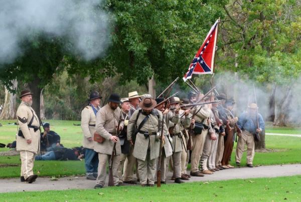Reenactors demonstrate a typical Civil War battle during the 30th annual Civil War Days event at Huntington Beach Central Park in Huntington Beach, Calif., on Sept. 3, 2023. (Sophie Li/The Epoch Times)