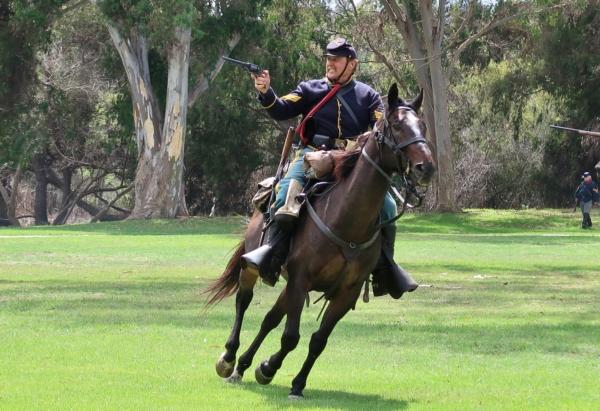 Reenactors demonstrate a typical Civil War battle during the 30th annual Civil War Days event at Huntington Beach Central Park in Huntington Beach, Calif., on Sept. 3, 2023. (Sophie Li/The Epoch Times)