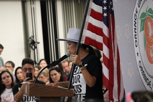 A supporter of a school district policy to notify parents when their child wishes to identify as transgender speaks during public comment at an Orange Unified School Board meeting in Orange, Calif., on Sept. 7, 2023. (Mei Lee/The Epoch Times)