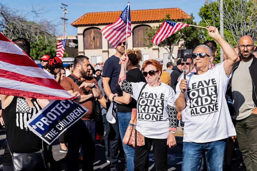(Left) Around 200 parental rights demonstrators march through downtown Los Angeles to protest against secret gender transitions in California public schools on Aug. 22, 2023. (Right) Parents, community members, and activists gather at a Glendale Unified School board meeting to protest against district policies on LGBT content in schools in Glendale, Calif., on June 20, 2023. (Courtesy of Hasmik Bezirdzhyan)
