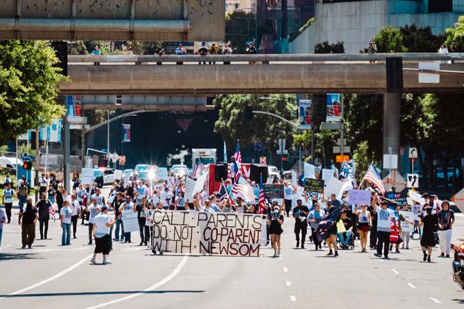 (Left) Around 200 parental rights demonstrators march through downtown Los Angeles to protest against secret gender transitions in California public schools on Aug. 22, 2023. (Right) Parents, community members, and activists gather at a Glendale Unified School board meeting to protest against district policies on LGBT content in schools in Glendale, Calif., on June 20, 2023. (Courtesy of Hasmik Bezirdzhyan)