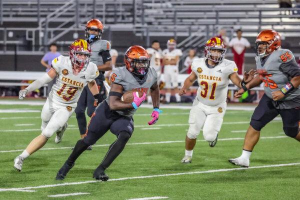 Orange High School running back Ardwon Morris (5) runs with the ball in a recent game. (Courtesy of Aaron Jacoby)