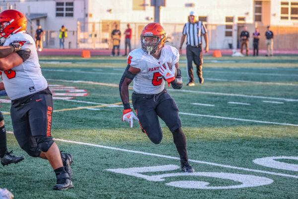 Orange High School running back Ardwon Morris (5) runs with the ball in a recent game. (Courtesy of Aaron Jacoby)