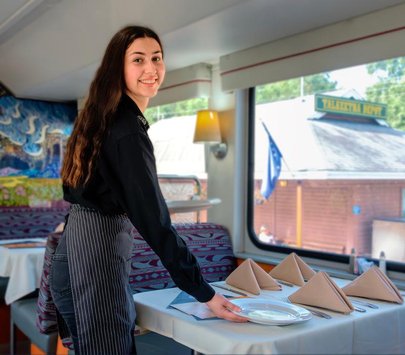 Server Josipa Tokic sets dining room tables for lunch. (Maria Coulson)