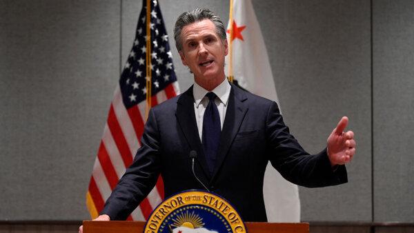California Gov. Gavin Newsom answers a question during a press conference in Beijing on Oct. 25, 2023. (Wang Zhao /AFP via Getty Images)