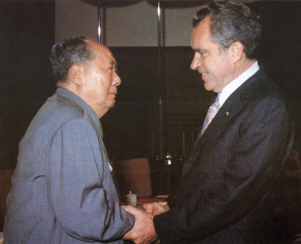 Chinese communist leader Chairman Mao Zedong (L) greets US President Richard Nixon, at his house in Beijing on Feb. 21, 1972. (AFP via Getty Images)