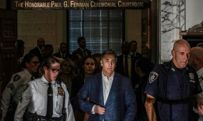 Michael Cohen walks out of the courtroom during a break in his testimony against his former employer, President Donald Trump, in New York on Oct. 24, 2023. (ALEX KENT/AFP via Getty Images)