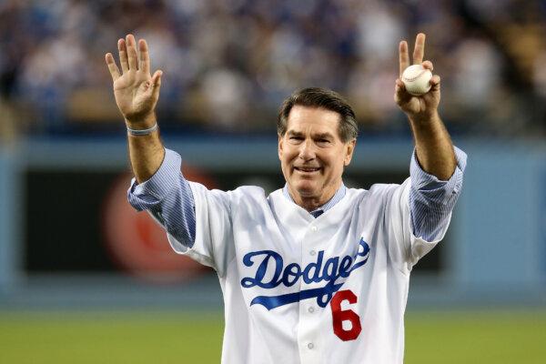 Los Angeles Dodgers legend Steve Garvey throws out a ceremonial first pitch before the Dodgers take on the Atlanta Braves in Game Four of the National League Division Series, at Dodger Stadium in Los Angeles on Oct. 7, 2013. (Stephen Dunn/Getty Images)