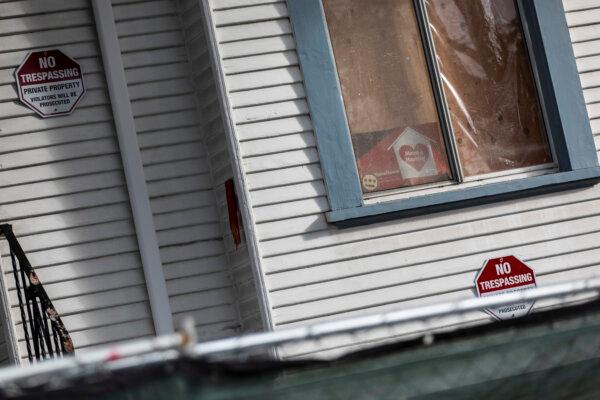 "No trespassing" signs hang on the front of a home in Oakland, Calif., on Jan. 28, 2020. (Philip Pacheco/AFP via Getty Images)