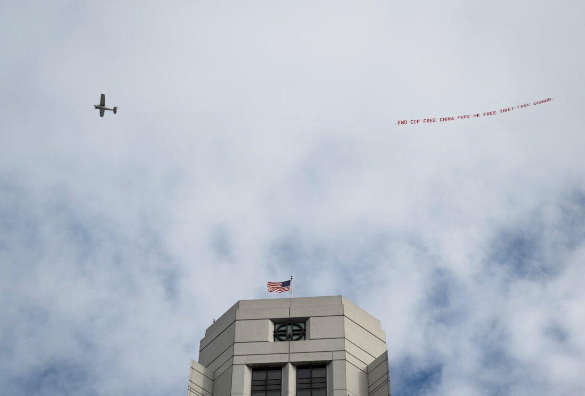 An airplane carries an anti-CCP (Chinese Communist Party) banner during the Asia-Pacific Economic Cooperation (APEC) leaders’ week in San Francisco on Nov. 14, 2023. (Andrew Caballero-Reynolds/AFP via Getty Images)