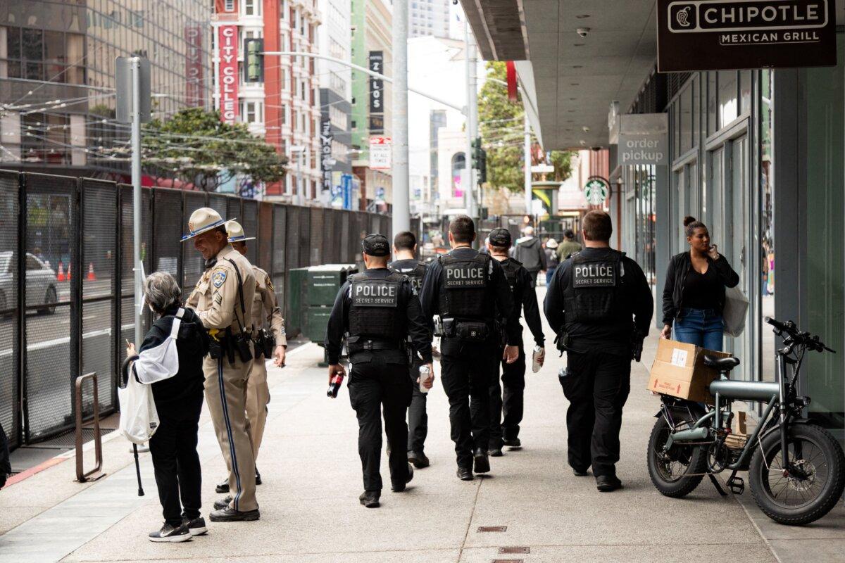 Secret Service Police and California Highway Patrol are seen outside the Asia-Pacific Economic Cooperation (APEC) summit in San Francisco on Nov. 14, 2023. The APEC Summit takes place through November 17. (Jason Henry/AFP via Getty Images)