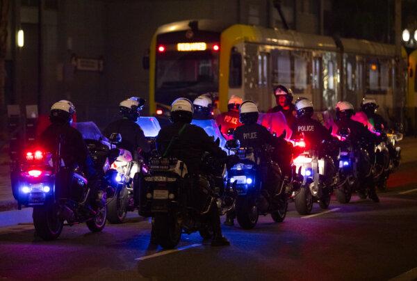 Los Angeles Police Department (LAPD) officers respond to civil unrest in Los Angeles, Calif., on Nov. 2, 2020. (John Fredricks/The Epoch Times)
