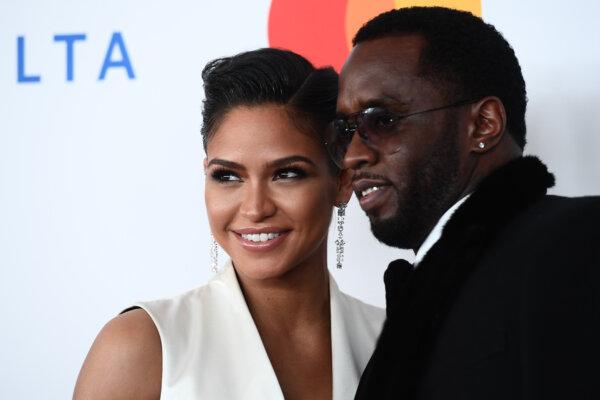 Singer and model Cassie Ventura (L) and rapper Diddy (aka Sean Combs) arrive for the traditional Clive Davis party on the eve of the 60th Annual Grammy Awards in New York on Jan. 28, 2018. (Jewel Samad/AFP via Getty Images)