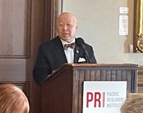 Lance Izumi, Koret Senior Fellow and senior director of education studies at the Pacific Research Institute, speaks to local business and community leaders at the Pacific Club in Newport Beach, Calif., on Nov. 30, 2023. (Courtesy of John Seiler)