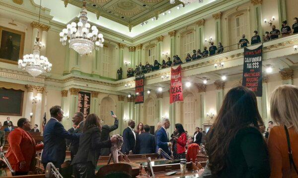 California's State Assembly meeting is disrupted when more than 1,000 protesters demanding an immediate cease-fire to the Israel-Hamas war in Gaza, Palestine, take over the California State Capitol building in Sacramento, Calif., on Jan. 3, 2023. (Travis Gillmore/The Epoch Times)