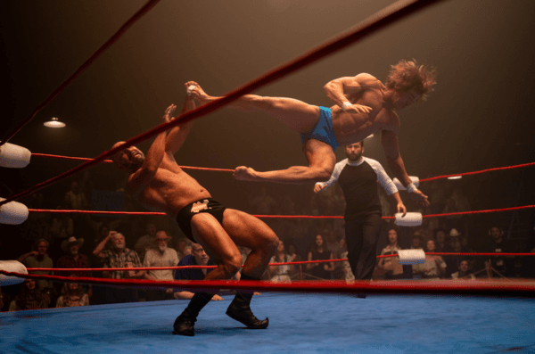 Kevin Von Erich (Zac Efron) taking out a wrestling opponent in "The Iron Claw." (A24/Lionsgate)