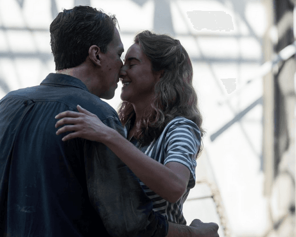 Enzo Ferrari (Adam Driver) and his lover Lina Lardi (Shalene Woodley), in "Ferrari." (Neon)