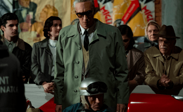 Enzo Ferrari (Adam Driver,  C), in "Ferrari." (Neon)